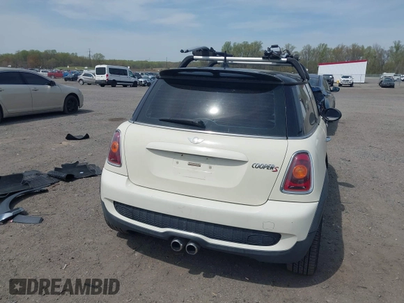 2007 MINI Hardtop S with VIN WMWMF73547TV31403, listed as a IAAI auction lot 42066433 with 156,730 mi miles and . Bid and sale history available at DreamBid. Image 17.