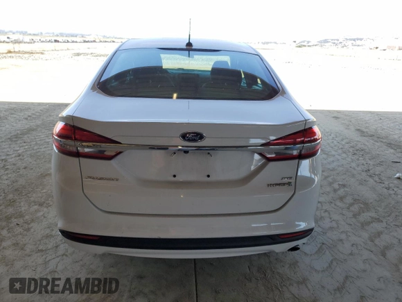 2018 Ford Fusion SE z VIN 3FA6P0LU4JR139169, wystawiony jako Copart lot #60086205 z przebiegiem 226 691 mil mil oraz Szkoda całkowita • Salvage title. Historia ofert i sprzedaży dostępna na DreamBid. Obrazek 6.