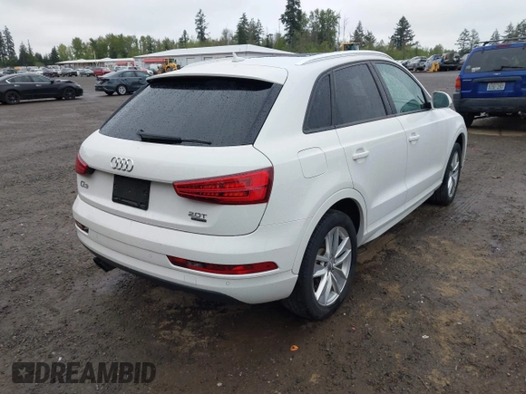 2017 Audi Q3 Premium with VIN WA1ECCFS5HR003565, listed as a IAAI auction lot 42140711 with 74,034 mi miles and . Bid and sale history available at DreamBid. Image 4.