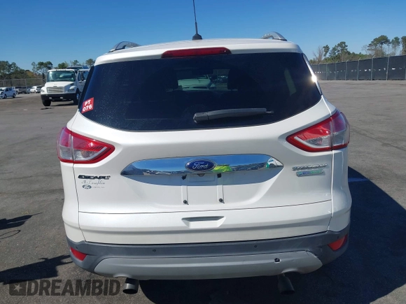 2015 Ford Escape Titanium with VIN 1FMCU0J94FUA69088, listed as a IAAI auction lot 41810406 with 167,749 mi miles. Bid and sale history available at carsss.com. Image 16.