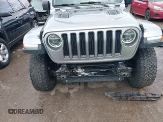 2018 Jeep Wrangler Unlimited Rubicon with VIN 1C4HJXFG4JW174603, listed as a IAAI auction lot 42202302 with 120,229 mi miles and . Bid and sale history available at DreamBid. Image 6.