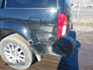 2012 Nissan Pathfinder LE z VIN 5N1AR1NB9CC638403, wystawiony jako IAAI lot #41612262 z przebiegiem Nie podano mil oraz . Historia ofert i sprzedaży dostępna na DreamBid. Obrazek 18.