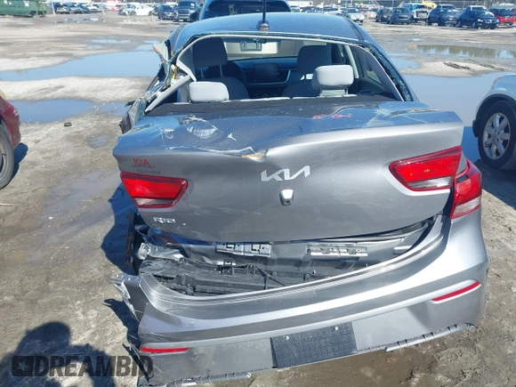 2023 Kia Rio LX z VIN 3KPA24AD5PE603017, wystawiony jako IAAI lot #41590704 z przebiegiem 44 553 mil mil oraz . Historia ofert i sprzedaży dostępna na DreamBid. Obrazek 16.