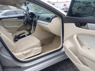 2012 Volkswagen Passat SE w/Sunroof with VIN 1VWBH7A36CC077412, listed as a IAAI auction lot 41651796 with 113,259 mi miles. Bid and sale history available at carsss.com. Image 5.