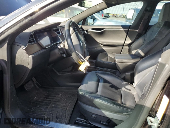 2016 Tesla Model S 90D with VIN 5YJSA1E2XGF150490, listed as a Copart auction lot 51070365 with 144,457 mi miles and Salvage Title. Bid and sale history available at DreamBid. Image 7.