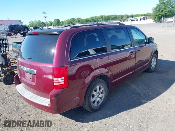2008 Chrysler Town & Country Touring with VIN 2A8HR54P48R832030, listed as a IAAI auction lot 42196711 with 216,742 mi miles and . Bid and sale history available at carsss.com. Image 4.