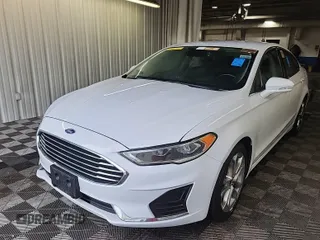 2020 Ford Fusion SEL with VIN 3FA6P0CD1LR154201, listed as a IAAI auction lot 42715761 with 99,448 mi miles and . Bid and sale history available at DreamBid. Image 51.