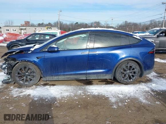 2022 Tesla Model X Plaid z VIN 7SAXCBE69NF343318, wystawiony jako IAAI lot #41387403 z przebiegiem Nie podano mil oraz . Historia ofert i sprzedaży dostępna na DreamBid. Obrazek 14.