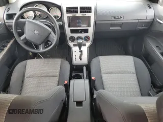 2009 Dodge Caliber SXT z VIN 1B3HB48A89D198108, wystawiony jako Copart lot #58910415 z przebiegiem 176 257 mil mil oraz Czysty tytuł • Clean title. Historia ofert i sprzedaży dostępna na DreamBid. Obrazek 8.