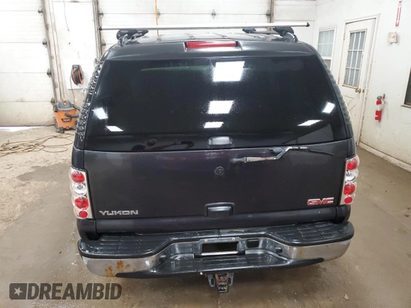 2006 GMC Yukon SLT with VIN 1GKEK13T96J137263, listed as a Copart auction lot 73783434 with 0 mi miles and Salvage Title. Bid and sale history available at carsss.com. Image 6.
