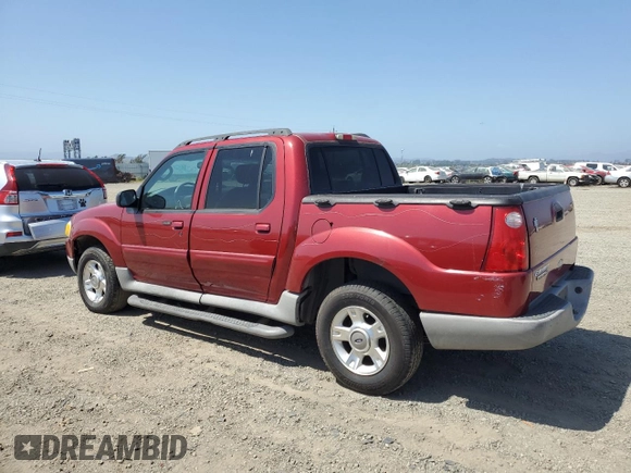 2003 Ford Explorer Sport Trac XLS with VIN 1FMZU67E23UA00848, listed as a Copart auction lot 55514955 with 101,070 mi miles and Salvage title. Bid and sale history available at DreamBid. Image 2.