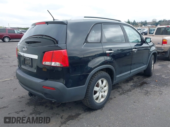 2012 Kia Sorento LX with VIN 5XYKT3A62CG281690, listed as a IAAI auction lot 41766386 with 108,464 mi miles. Bid and sale history available at carsss.com. Image 4.