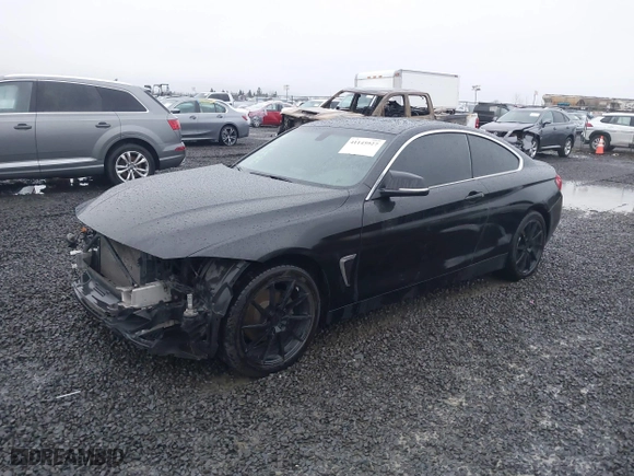 2015 BMW 4 Series 428i xDrive with VIN WBA3N5C56FK197981, listed as a IAAI auction lot 41145927 with 101,944 mi miles. Bid and sale history available at carsss.com. Image 18.