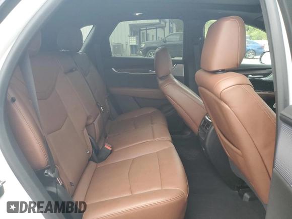 2023 Cadillac XT5 AWD Sport with VIN 1GYKNGRS4PZ176086, listed as a Copart auction lot 53955535 with 15,709 mi miles and Salvage title. Bid and sale history available at DreamBid. Image 11.