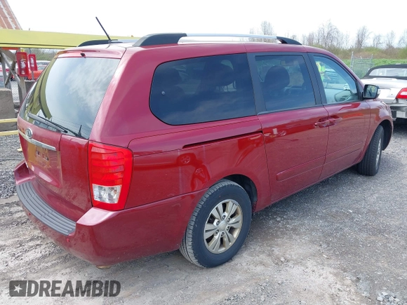 2012 Kia Sedona LX with VIN KNDMG4C71C6493153, listed as a IAAI auction lot 42176426 with 122,375 mi miles. Bid and sale history available at carsss.com. Image 4.