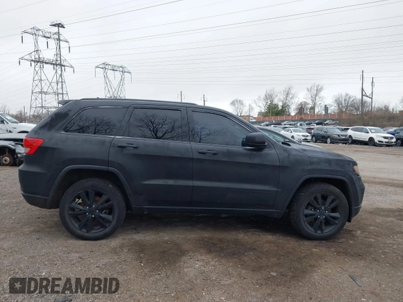 2013 Jeep Grand Cherokee Laredo with VIN 1C4RJEAG2DC573970, listed as a IAAI auction lot 41892914 with 185,050 mi miles. Bid and sale history available at carsss.com. Image 13.