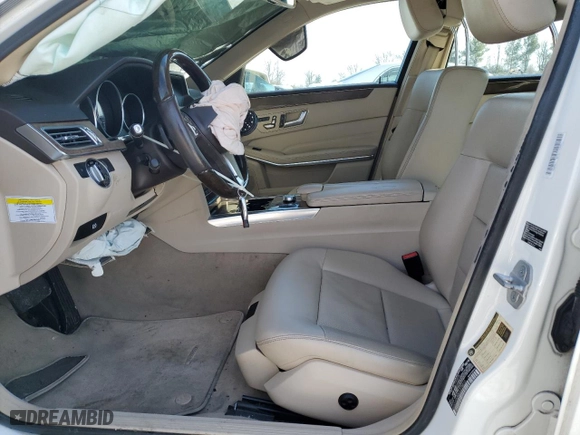2014 Mercedes-Benz E-Class E 350 Luxury with VIN WDDHF8JB8EA775010, listed as a Copart auction lot 41767055 with 168,569 mi miles and Salvage Title. Bid and sale history available at carsss.com. Image 7.
