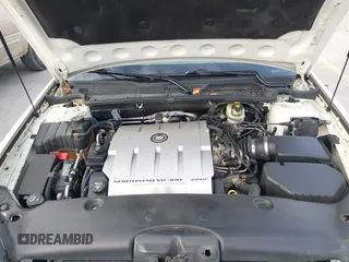 2004 Cadillac DeVille DTS z VIN 1G6KF579X4U238691, wystawiony jako IAAI lot #41367367 z przebiegiem 69 902 mil mil oraz . Historia ofert i sprzedaży dostępna na DreamBid. Obrazek 10.