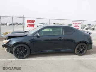 2016 Scion tC with VIN JTKJF5C76GJ017584, listed as a IAAI auction lot 41938981 with 121,166 mi miles. Bid and sale history available at carsss.com. Image 14.