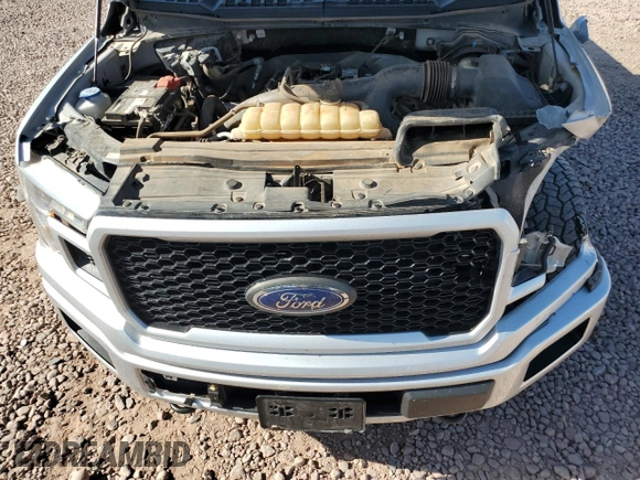 2019 Ford F-150 XL with VIN 1FTEW1EPXKKD82772, listed as a Copart auction lot 61176535 with 121,067 mi miles and Salvage title. Bid and sale history available at DreamBid. Image 11.