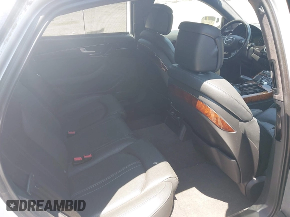 2011 Audi A8 with VIN WAURVAFD4BN019033, listed as a IAAI auction lot 42532173 with 97,486 mi miles and . Bid and sale history available at DreamBid. Image 8.