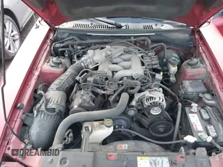 2004 Ford Mustang Deluxe with VIN 1FAFP44604F212319, listed as a IAAI auction lot 42100591 with 191,992 mi miles. Bid and sale history available at carsss.com. Image 9.