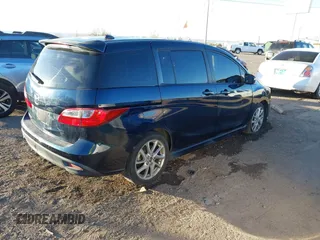 2014 Mazda 5 Grand Touring z VIN JM1CW2DL7E0175624, wystawiony jako IAAI lot #41469852 z przebiegiem 118 698 mil mil oraz . Historia ofert i sprzedaży dostępna na DreamBid. Obrazek 4.