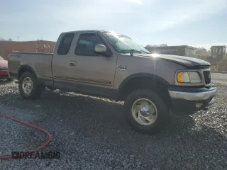 2001 Ford F-150 XL with VIN 1FTRX18L61NB63912, listed as a Copart auction lot 46839725 with 198,649 mi miles and Salvage Title. Bid and sale history available at carsss.com. Image 4.