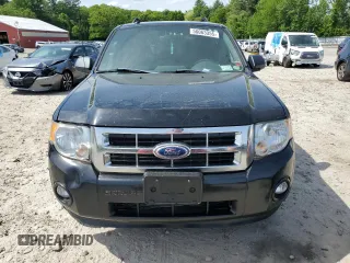 2011 Ford Escape XLT with VIN 1FMCU9DGXBKA90337, listed as a Copart auction lot 56063355 with 122,956 mi miles and Non repairable. Bid and sale history available at DreamBid. Image 5.