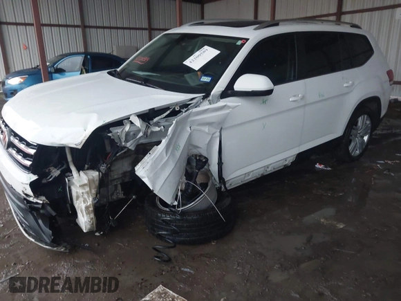 2019 Volkswagen Atlas SE with VIN 1V2WR2CA8KC526036, listed as a IAAI auction lot 42200589 with 118,590 mi miles and . Bid and sale history available at DreamBid. Image 2.