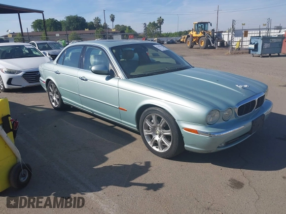 2004 Jaguar XJ 8 with VIN SAJEA71CX4SG10751, listed as a IAAI auction lot 42149348 with 89,786 mi miles and . Bid and sale history available at DreamBid. Image 1.