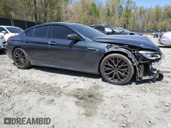 2016 BMW M6 with VIN WBS6E9C5XGG437084, listed as a Copart auction lot 53632315 with 108,151 mi miles and Salvage title. Bid and sale history available at DreamBid. Image 4.