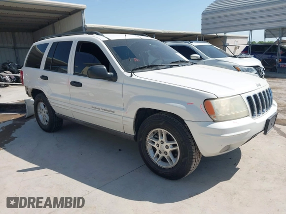 2003 Jeep Grand Cherokee Laredo with VIN 1J4GX48S43C518584, listed as a IAAI auction lot 42213094 with 163,743 mi miles and . Bid and sale history available at DreamBid. Image 1.