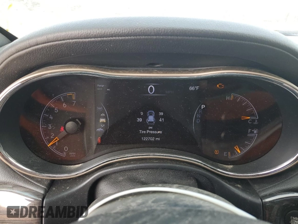2017 Jeep Grand Cherokee Overland with VIN 1C4RJFCG0HC762612, listed as a Copart auction lot 57400095 with 122,702 mi miles and Salvage title. Bid and sale history available at DreamBid. Image 9.