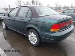 1996 Saturn SL with VIN 1G8ZK5277TZ293544, listed as a IAAI auction lot 41858643 with 189,450 mi miles and . Bid and sale history available at DreamBid. Image 3.