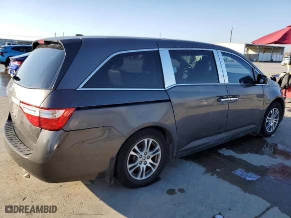 2011 Honda Odyssey EX-L with VIN 5FNRL5H65BB094319, listed as a Copart auction lot 87483484 with 250,580 mi miles and Salvage Title. Bid and sale history available at carsss.com. Image 3.