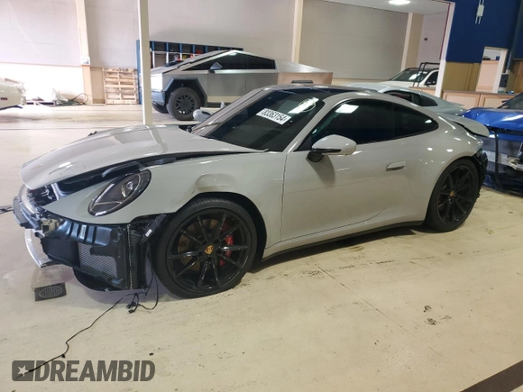 2024 Porsche 911 Carrera S with VIN WP0AB2A91RS220787, listed as a Copart auction lot 83363154 with 2,049 mi miles and Salvage Title. Bid and sale history available at carsss.com. Image 1.