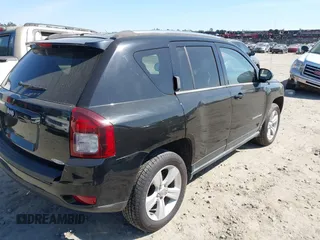 2014 Jeep Compass Latitude with VIN 1C4NJDEBXED551427, listed as a IAAI auction lot 41863047 with 75,913 mi miles. Bid and sale history available at carsss.com. Image 4.