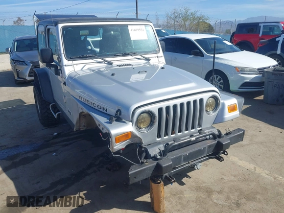 2004 Jeep Wrangler Rubicon with VIN 1J4FA69S94P701660, listed as a IAAI auction lot 41699554 with 74,640 mi miles. Bid and sale history available at carsss.com. Image 1.