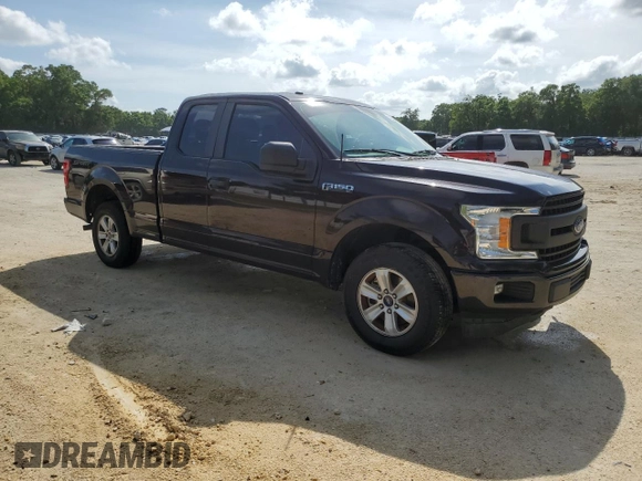 2018 Ford F-150 XL with VIN 1FTEX1CB0JFB12963, listed as a Copart auction lot 51076365 with 107,086 mi miles and Salvage Title. Bid and sale history available at carsss.com. Image 4.