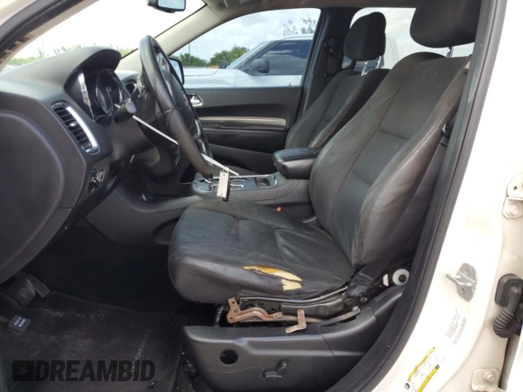 2012 Dodge Durango SXT z VIN 1C4RDHAG0CC329788, wystawiony jako Copart lot #61101745 z przebiegiem 208 302 mil mil oraz Szkoda całkowita • Salvage title. Historia ofert i sprzedaży dostępna na DreamBid. Obrazek 7.