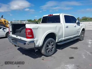 2020 Ram 2500 Longhorn with VIN 3C6UR5GL6LG230556, listed as a IAAI auction lot 38787704 with Not provided miles and . Bid and sale history available at DreamBid. Image 4.