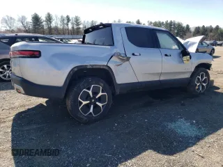 2023 Rivian R1T Adventure with VIN 7FCTGBAA8PN027711, listed as a Copart auction lot 49449155 with 16,031 mi miles and Salvage Title. Bid and sale history available at carsss.com. Image 3.