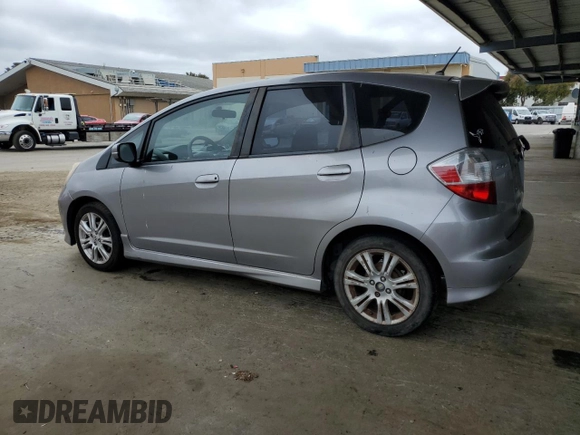 2009 Honda Fit Sport z VIN JHMGE884X9C002533, wystawiony jako Copart lot #62222155 z przebiegiem 133 148 mil mil oraz Czysty tytuł • Clean title. Historia ofert i sprzedaży dostępna na DreamBid. Obrazek 2.