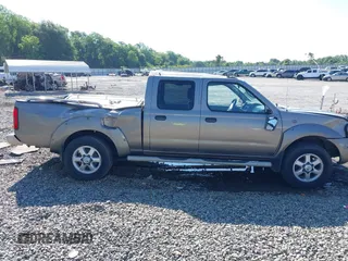 2003 Nissan Frontier SE z VIN 1N6ED29X43C402027, wystawiony jako IAAI lot #42252471 z przebiegiem 104 233 mil mil oraz . Historia ofert i sprzedaży dostępna na DreamBid. Obrazek 13.
