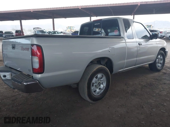 1999 Nissan Frontier XE z VIN 1N6DD26S3XC340419, wystawiony jako IAAI lot #40964630 z przebiegiem 156 431 mil mil oraz . Historia ofert i sprzedaży dostępna na DreamBid. Obrazek 4.