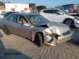 2000 Toyota Camry LE z VIN 4T1BF22KXYU946821, wystawiony jako IAAI lot #41797855 z przebiegiem 280 448 mil mil oraz . Historia ofert i sprzedaży dostępna na DreamBid. Obrazek 1.