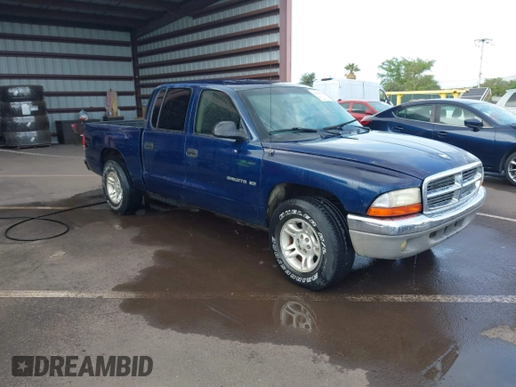 2001 Dodge Dakota Sport with VIN 1B7GL2AX01S133957, listed as a IAAI auction lot 41644558 with 156,008 mi miles. Bid and sale history available at carsss.com. Image 1.