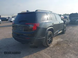 2023 GMC Acadia SLT with VIN 1GKKNMLS8PZ253608, listed as a IAAI auction lot 42264701 with 25,469 mi miles and . Bid and sale history available at DreamBid. Image 4.