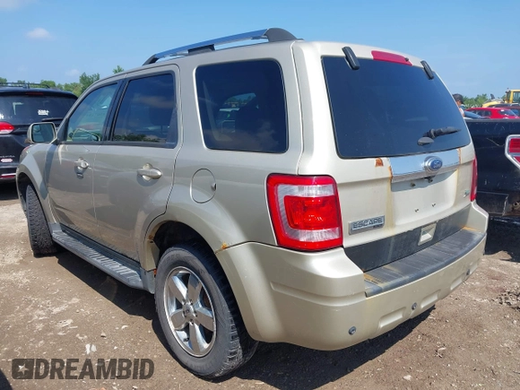 2012 Ford Escape Limited z VIN 1FMCU9EG5CKB58768, wystawiony jako IAAI lot #42671813 z przebiegiem 148 123 mil mil oraz . Historia ofert i sprzedaży dostępna na DreamBid. Obrazek 3.